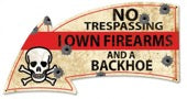 No Trespassing I Own Firearms and a Backhoe Embossed Metal Sign